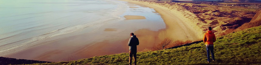 image of people on a sand dune